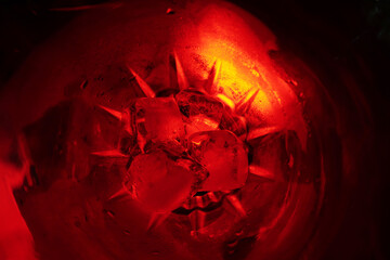 ice cubes in glass with Red LED lighting 