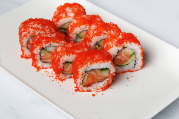  Sushi roll maki with salmon and flying fish roe  - 769101582