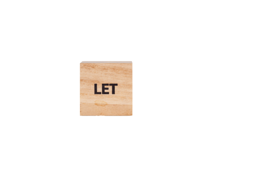 wooden cubes with the inscription Let on a white isolated background close-up