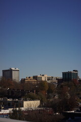 Fototapeta na wymiar Fayetteville, AR - November 15th, 2023 - Downtown Buildings From Afar