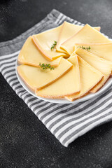 raclette cheese tasty eating delicious traditional meal cooking appetizer meal food snack on the table copy space food background rustic top view