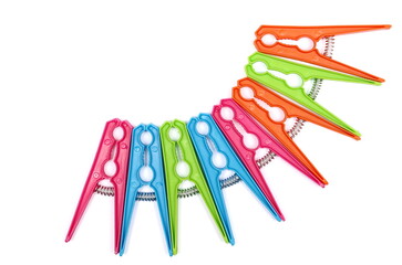 Set colorful clothespins pile isolated on white, top view - 769115906