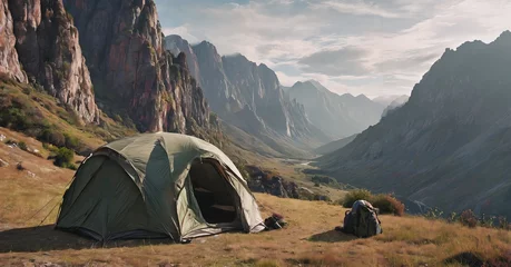 Selbstklebende Fototapeten Adventure Equipment. A campsite nestled in a beautiful valley of a National Forest park where wildlife and natural rock formations create a scenic view. © Matthew