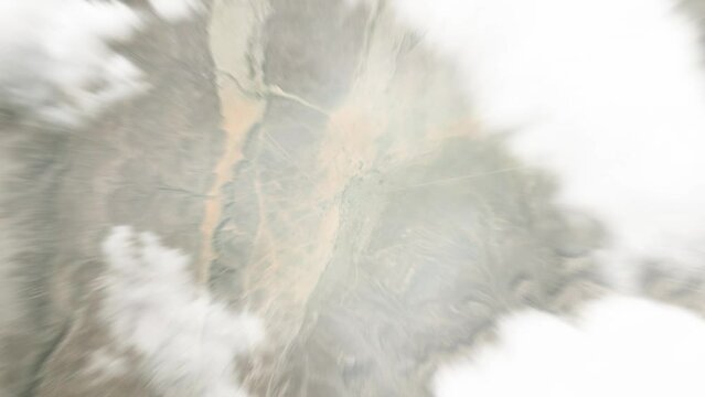 Earth zoom in from space to Atar, Mauritania. Followed by zoom out through clouds and atmosphere into space. Satellite view. Travel intro. Images from NASA
