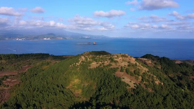 Aerial shot of Mt. Sanbangsan, a volcanic cone on Jeju Island, South Korea.