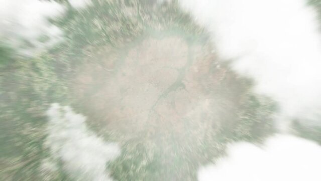 Earth zoom in from space to Sikasso, Mali. Followed by zoom out through clouds and atmosphere into space. Satellite view. Travel intro. Images from NASA