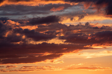 Fototapeta na wymiar Dramatic sunset, clouds of different shades