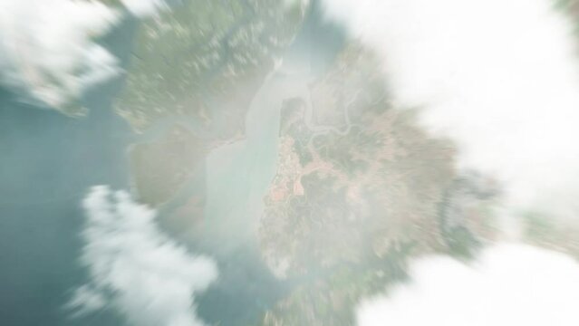 Earth zoom in from space to Kamsar, Guinea. Followed by zoom out through clouds and atmosphere into space. Satellite view. Travel intro. Images from NASA
