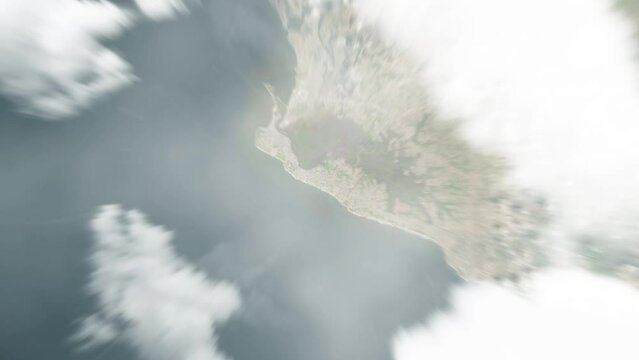 Earth zoom in from space to Monrovia, Liberia. Followed by zoom out through clouds and atmosphere into space. Satellite view. Travel intro. Images from NASA