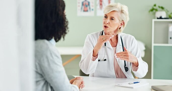 Woman, doctor or consulting with patient for healthcare advice, prescription or diagnosis at clinic. Female person, cardiologist or medical worker explaining process to client in consultation or help