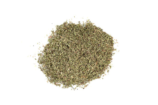 Top view of a bunch of dried thyme leaves on a white background.