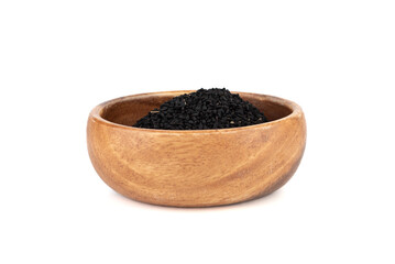 Black sesame in wooden bowl on white background.