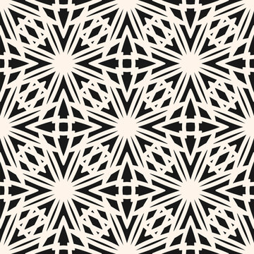 Abstract geometric mosaic ornament. Vector black and white seamless pattern with grid, lattice, ornamental shapes, floral silhouettes. Simple monochrome background texture. Repeated modern geo design