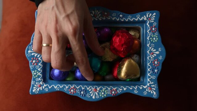 Eid Celebration Among Family with Chocolate and Cologne (&Ccedil;ikolata ve Kolonya ile Bayramlasma) Colorful Candy and Chocolate, Ramadan Kareem Concept Photo, &Uuml;sk&uuml;dar Istanbul, Turkiye (Turkey)

