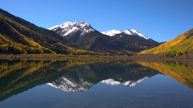 Epic Perfect Reflection Mirror Crystal Lake Colorado Autumn Snowcapped Mountains.