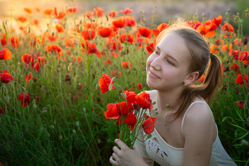 Naklejka premium Scarlet Symphony: A Woman Lost in the Enchanting Dance of Poppies