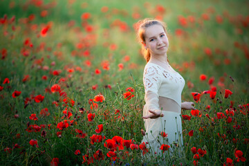Fields of Dreams: A Girl Enveloped by the Vibrant Sea of Poppies