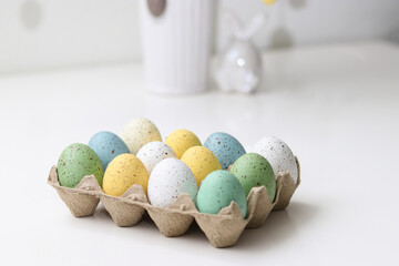 Colorful easter eggs decoration on white table