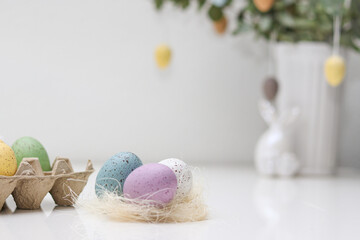 Colorful easter eggs decoration on white table