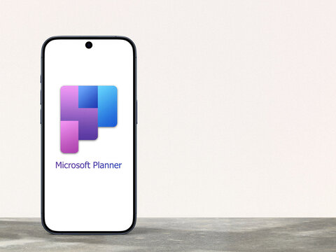 new 2024 Microsoft Planner logo is displayed on a modern smartphone, planning application on the Microsoft 365 platform, team management, sharing, and organization