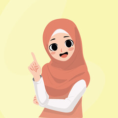 Young Hijab Girl Pointing to Her Right Side