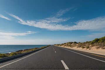 Fototapeta premium empty straight road to the sea