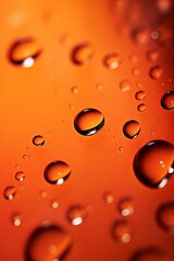 Fototapeta na wymiar water droplets on all orange, matte background