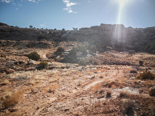 Dirt bike trail through Moab Utah desert landscape