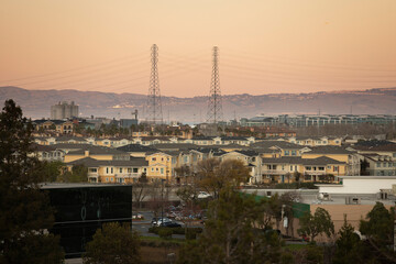 Obraz premium Sunset view of a dense housing neighborhood of Redwood City, California, USA.