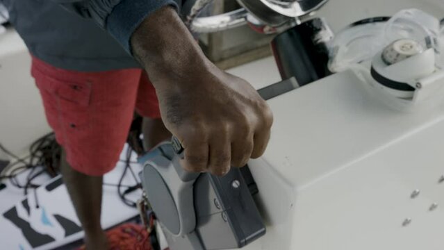 Close up on hand on boat accelerator - steady cam