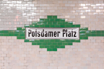 signage Potsdamer Platz - engl. Potsdam square -  at the metro station in Berlin