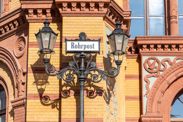 sign Rohrpost at Post office building on Oranienburger street in Berlin