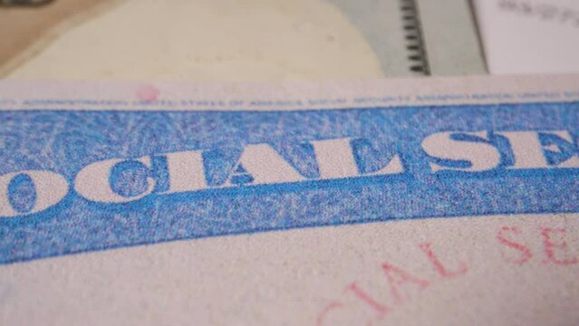 12 extreme macro close up of social security card ssn bills US dollar bills