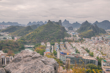 aerial of Guilin town with sunset glow ,beautiful karst mountain scenery,China