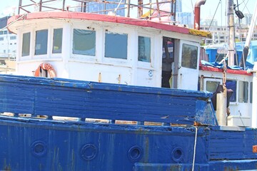 An old fishing trawler - boat. Docked at sydney fish markets