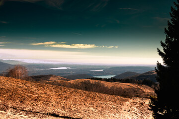Stunning view from Mottarone mountain on a winter morning, with lakes in the bright February light. Piedmont - Italy.