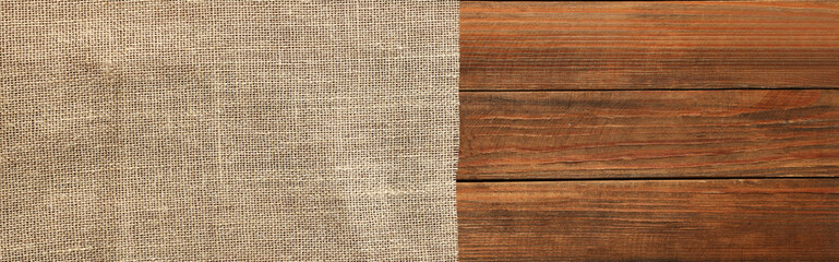 Naklejka premium Burlap fabric on wooden table, top view. Space for text