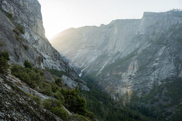 Light Rays Shine Into The Valley Below Snow Creek Falls In Yosemite