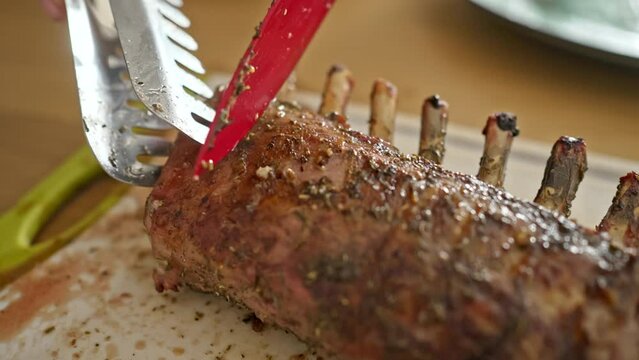 Culinary Delight - Expertly Cooked Rack Of Lamb Skillfully Carved