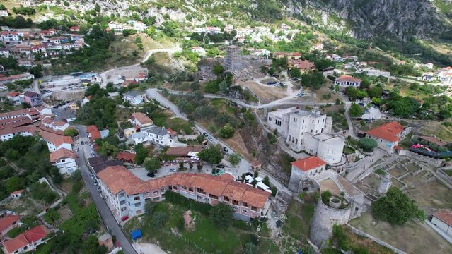 The fortress of Kruja (Albania) with the bazaar in the foreground filmed from above.