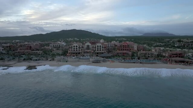 Hacienda del Mar Los Cabos At Sunset - Beachfront Hotel In Cabo San Lucas, Mexico. aerial approaching shot