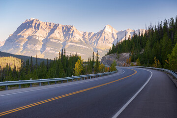 Scenic road through the Rocky Mountains; early morning light