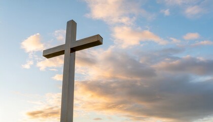 wooden cross against a serene sky symbolizing faith and renewal in the spirit of easter