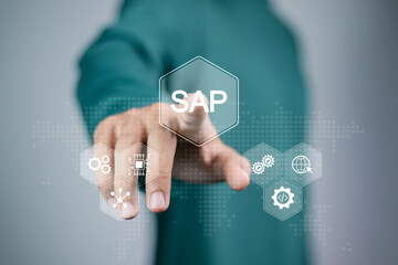 SAP, ERP enterprise resources planning system concept. Person touching  SAP icon for business...