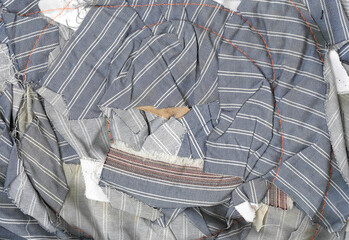 Detail of the texture of the folded crumpled fabric with the threads visible very clearly. Fabric...