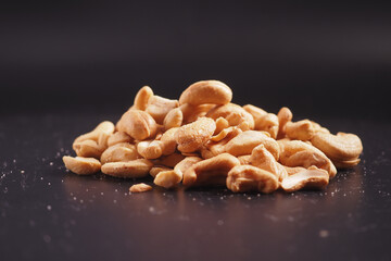 cashew nuts on black color background 