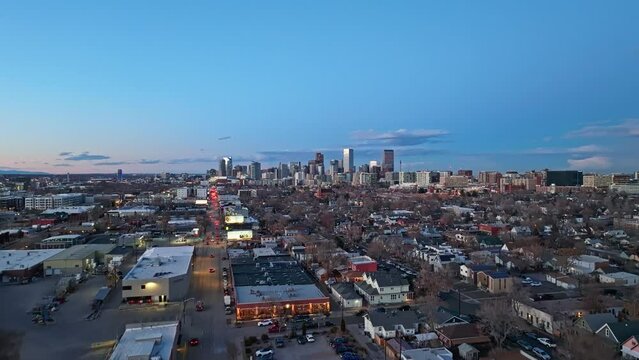 Panoramic aerial ascend over suburban neighborhood outside of Denver colorado main downtown city center