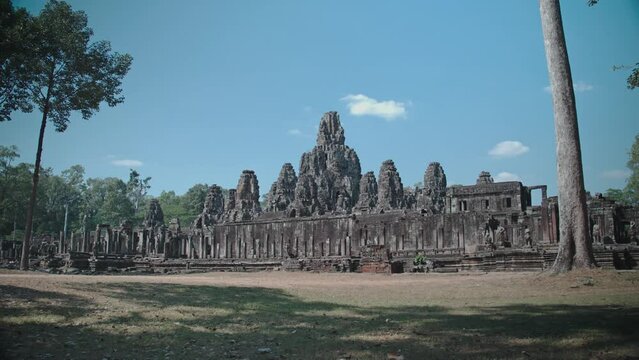 Exterior View Of Bayon Temple at Angkor in Cambodia. - wide shot