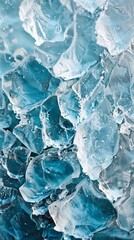 Beautiful original background image in a wide format in light blue tones of the surface with the texture of ice or stone 