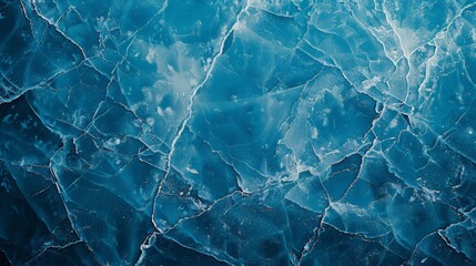 Abstract ice background Blue background with cracks on the ice surface 